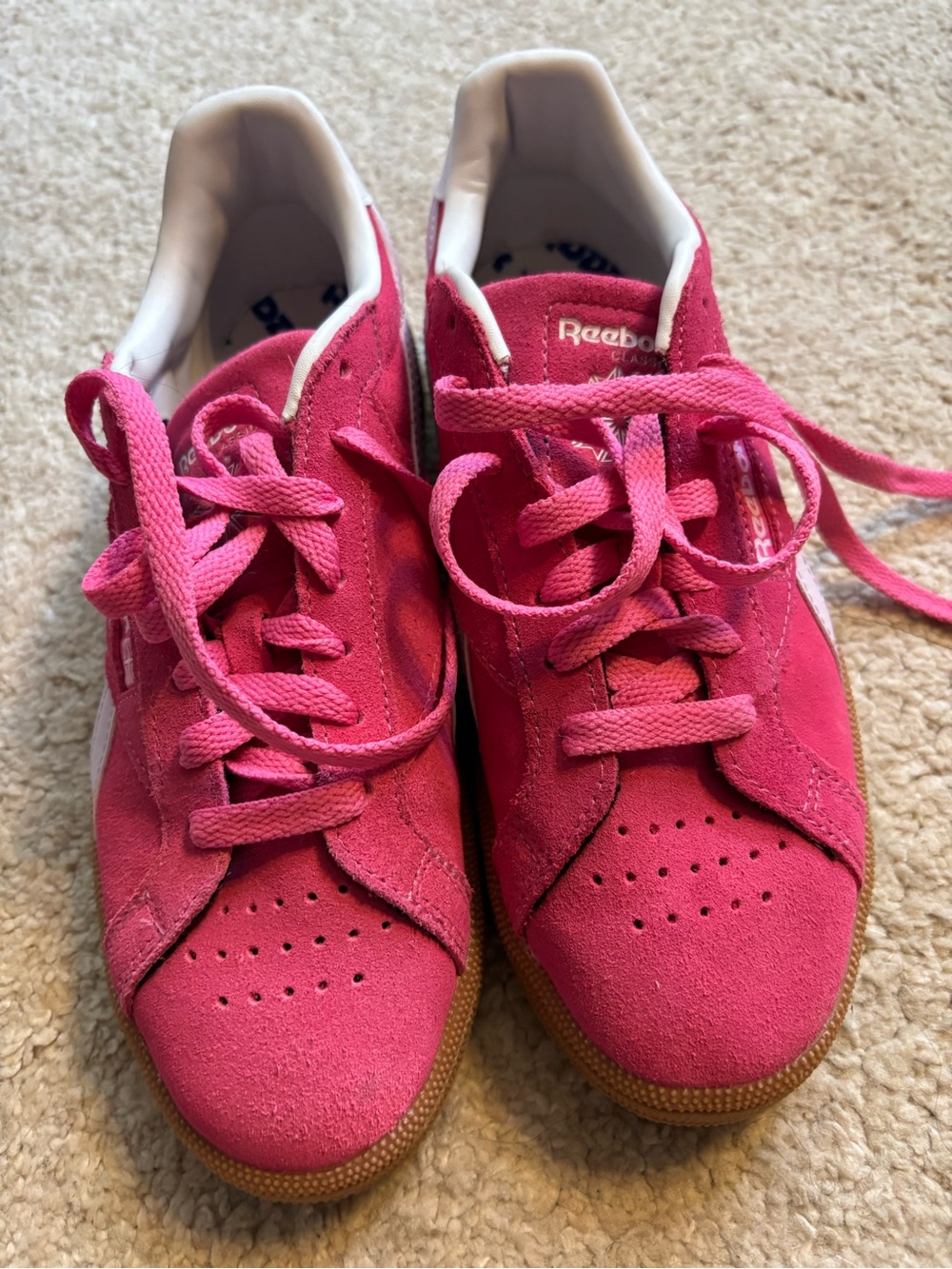 Cute suede Reebok’s pink casual sneakers. Unworn; NWOT